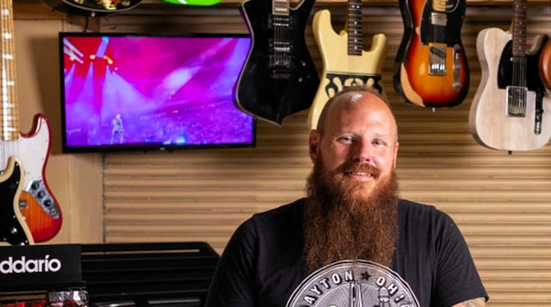 Mike Bisig, owner of Mike's Bike Park, recently opened up Rock Local, music shops in both Dayton and Huber Heights. CONTRIBUTED
