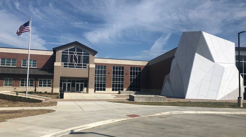 The main entrance of the new Northridge preK-12 school campus includes a red “N” embedded in the glass above the doors on Timber Lane, just off North Dixie Drive. The 2019-20 school year, delayed by construction of the school building as well as fallout from the Memorial Day tornado, begins on Sept. 23. JEREMY P. KELLEY / STAFF