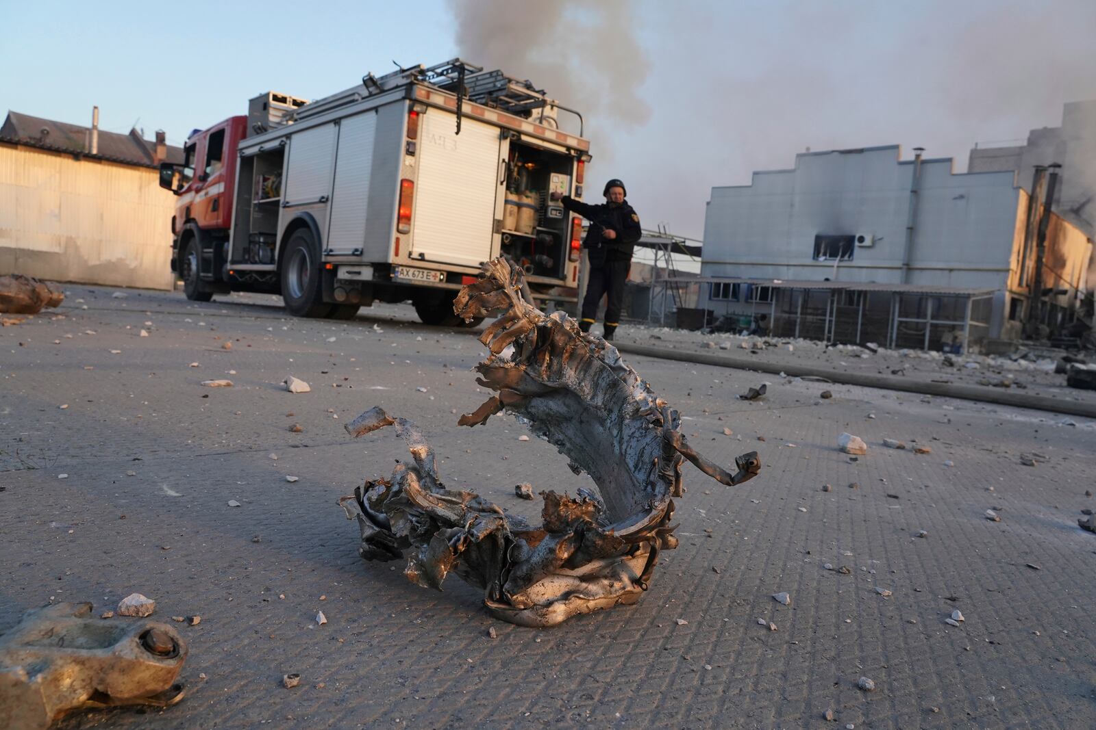 Part of a rocket lies on the floor in front of a perfume and cosmetics factory destroyed by a Russian strike in Kharkiv, Ukraine, Friday April 18, 2025. (AP Photo/Andrii Marienko)