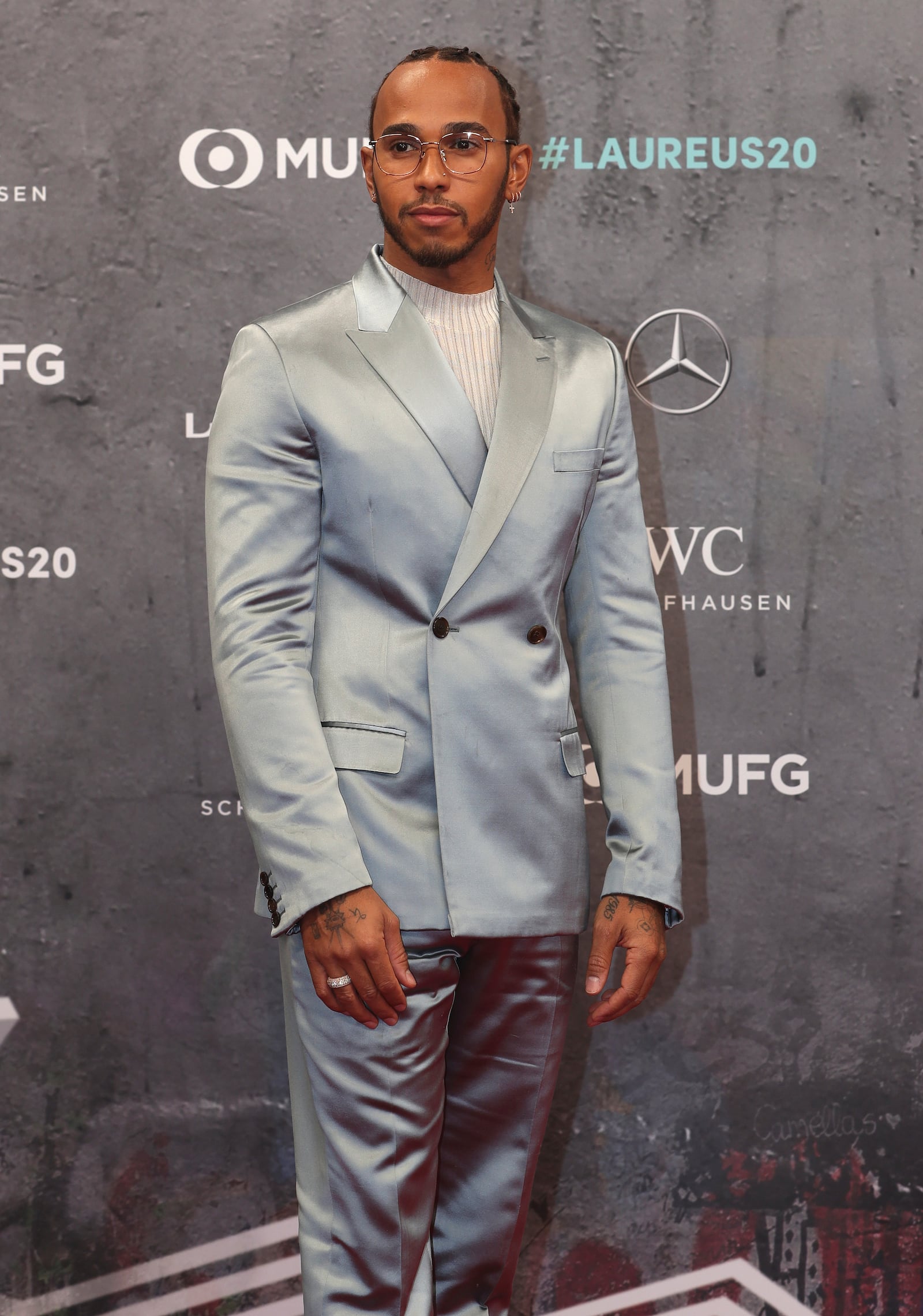 FILE - British reigning F1 drivers champion Lewis Hamilton arrives for the 2020 Laureus World Sports Awards in Berlin, Germany, Monday, Feb. 17, 2020. (AP Photo/Michael Sohn, File)