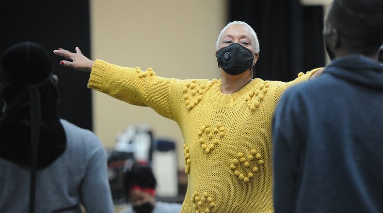 Dayton Contemporary Dance Company Chief Artistic and Producing Director Debbie Blunden-Diggs works with the company dancers Thursday Feb. 10, 2022. MARSHALL GORBY\STAFF