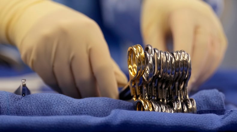 FILE - Surgical instruments are arranged during an organ procurement surgery June 15, 2023, in Tennessee. (AP Photo/Mark Humphrey, File)