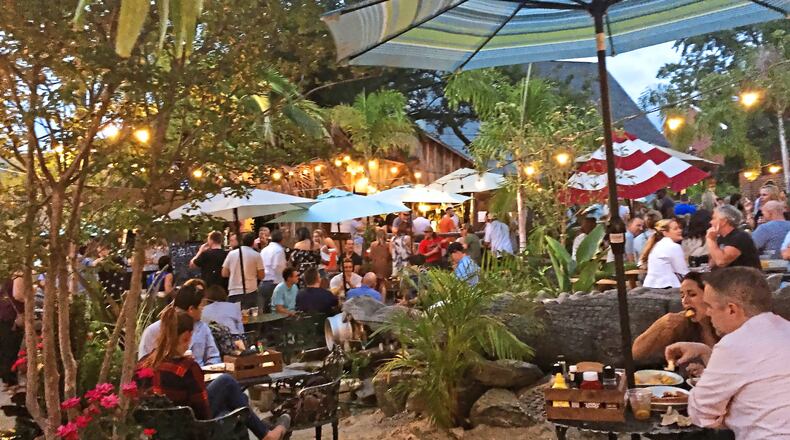 On Friday evenings, the outdoor “beach” at MacDowell Brew Kitchen in Leesburg, Va., is a hot spot for happy hour. (Gretchen McKay/Pittsburgh Post-Gazette/TNS)