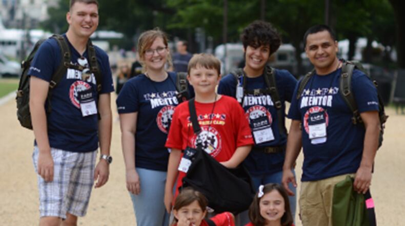 Military members volunteer as mentors for children of fallen service members at Tragedy Assistance Program for Survivors seminars. Mentors consist of active-duty, retired or veterans from Operation Iraqi Freedom and Operation Enduring Freedom. Mentors facilitate children’s activities during the 2-day event. (Contributed photo)