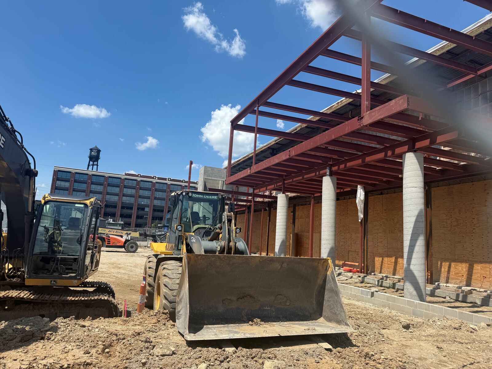 Woodard Development is renovating and adding onto a 30,000-square-foot warehouse at 435 E. Third St. in downtown Dayton. The building, which once belonged to KK Motorcycle Supply,  will become Class A office space. CORNELIUS FROLIK / STAFF