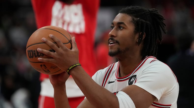 FILE - Chicago Bulls guard Jaden Ivey warms up before an NBA basketball game against the Toronto Raptors, Thursday, Feb. 19, 2026, in Chicago. (AP Photo/Erin Hooley, File)