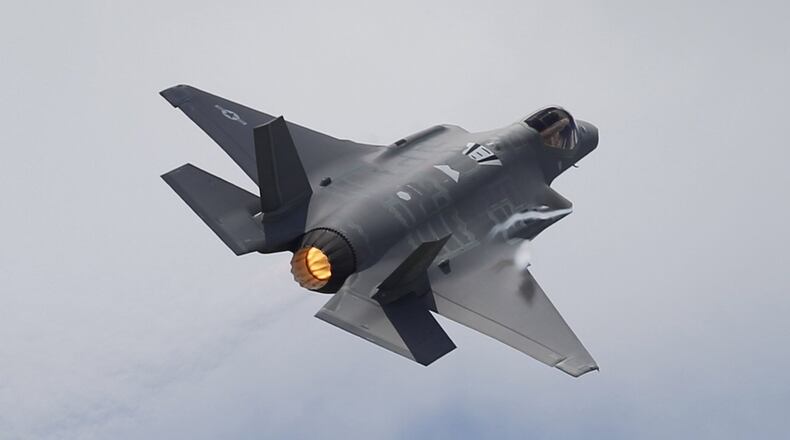 The F-35A Joint Strike Fighter, see here performing at the Vectren Dayton Air Show in June, helped account for the second highest sales on record in fiscal year 2017 at the Air Force Security Assistance and Cooperation Directorate at Wright-Patterson Air Force Base. TY GREENLEES / STAFF