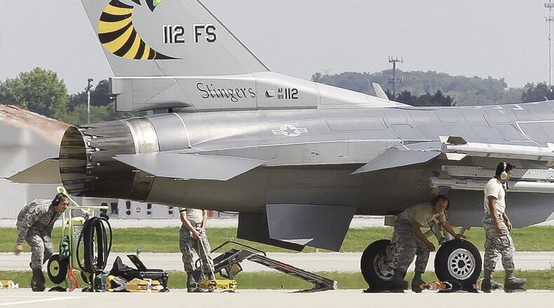 F-16 crews from the Ohio Air National Guard’s 180th Fighter Wing flew training missions out of Wright-Patterson Air Force Base in August 2013 as their home runway at Toledo Express Airport was repaved. CHRIS STEWART / STAFF FILE PHOTO