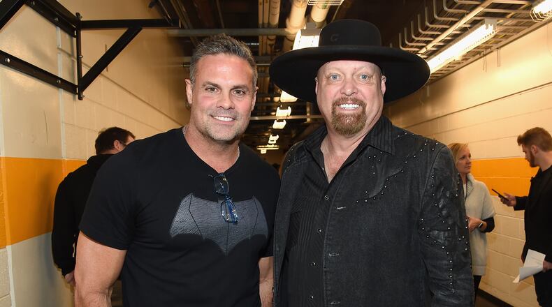 NASHVILLE, TN - FEBRUARY 08: Troy Gentry and Eddie Montgomery of Montgomery Gentry backstage during 1 Night. 1 Place. 1 Time: A Heroes & Friends Tribute to Randy Travis at Bridgestone Arena on February 8, 2017 in Nashville, Tennessee. (Photo by Rick Diamond/Getty Images for Outback Concerts)