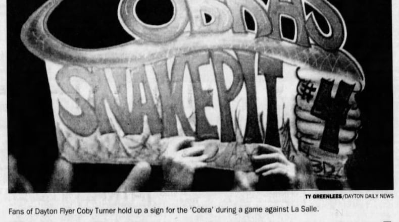 A sign at UD Arena honors Dayton's Coby Turner in 1998. Ty Greenlees/Staff