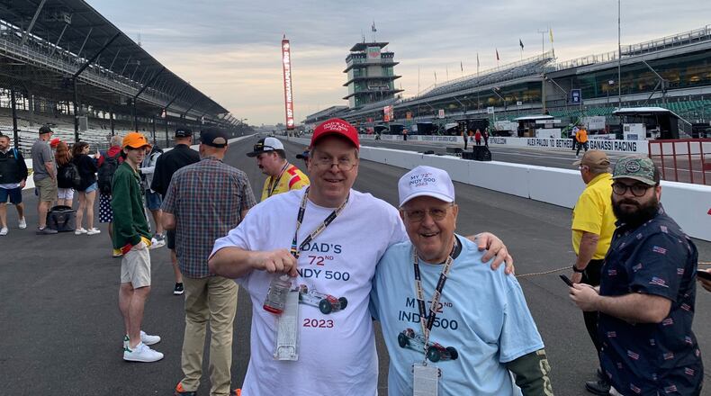 Greg (left) and Ed Gyenes on straightaway at the Indianapolis 500 on Sunday. CONTRIBUTED