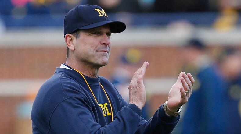 ANN ARBOR, MI - APRIL 01: Head coach Jim Harbaugh of the Michigan Wolverines looks on prior to the Michigan Football Spring Game on April 1, 2016 at Michigan Stadium in Ann Arbor, Michigan.  (Photo by Gregory Shamus/Getty Images)