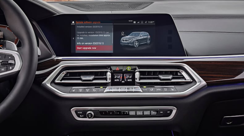 This photo provided by BMW is an example of a modern infotainment system that has multiple methods of input. Technology is helping to make driving safer for motorists and their passengers. (Courtesy of BMW via AP)
