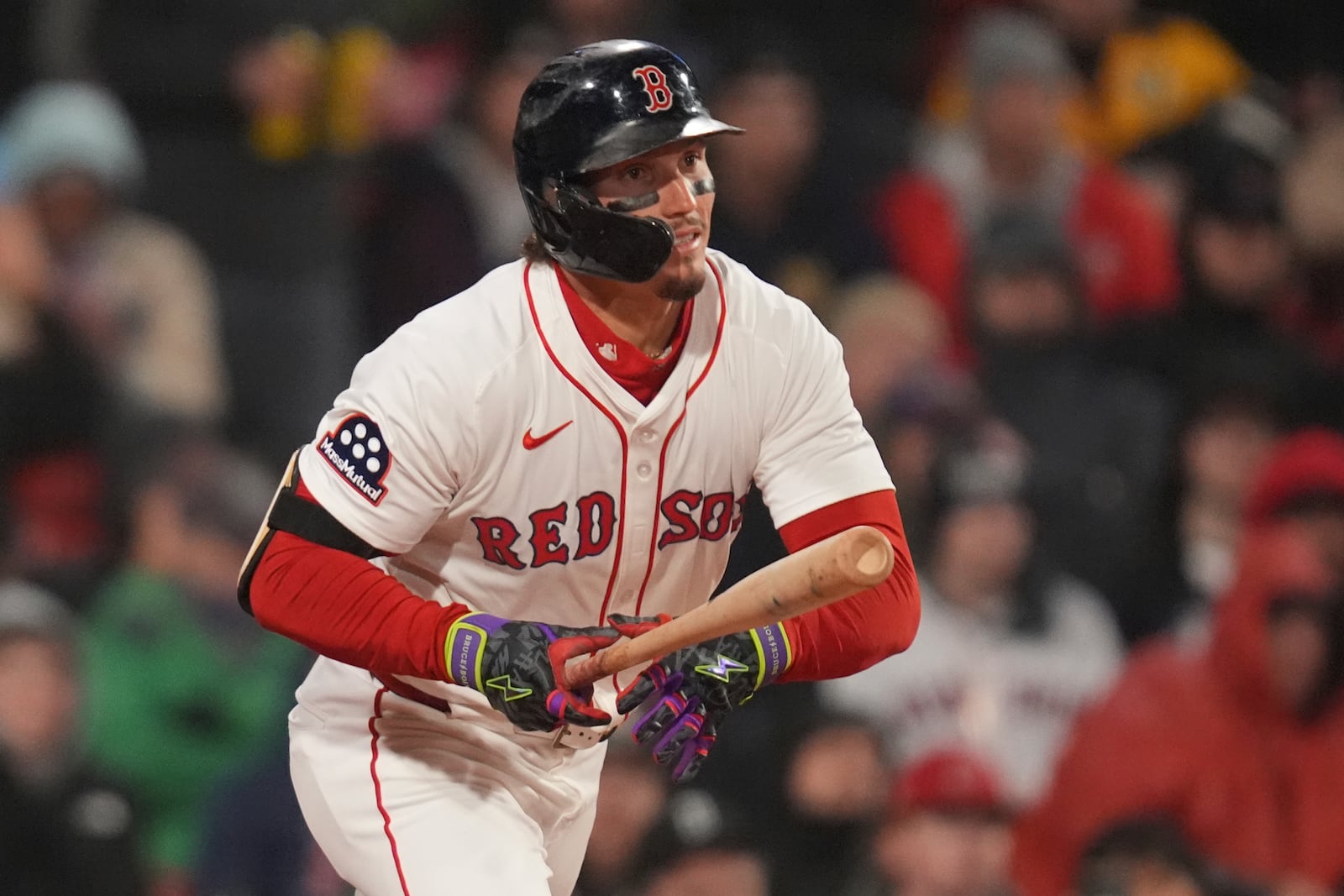 Boston Red Sox's Jarren Duran watches the flight of his double during third inning of a baseball game against the Toronto Blue Jays, Monday, April 7, 2025, in Boston. (AP Photo/Charles Krupa)