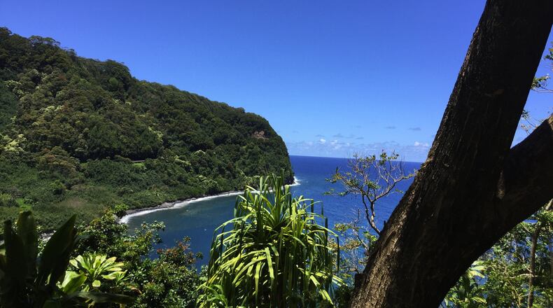 The lookout over Honomanu Bay, at Mile 14 on the way to Hana, does its best to take your breath away. (Bethany Jean Clement/The Seattle Times/TNS)