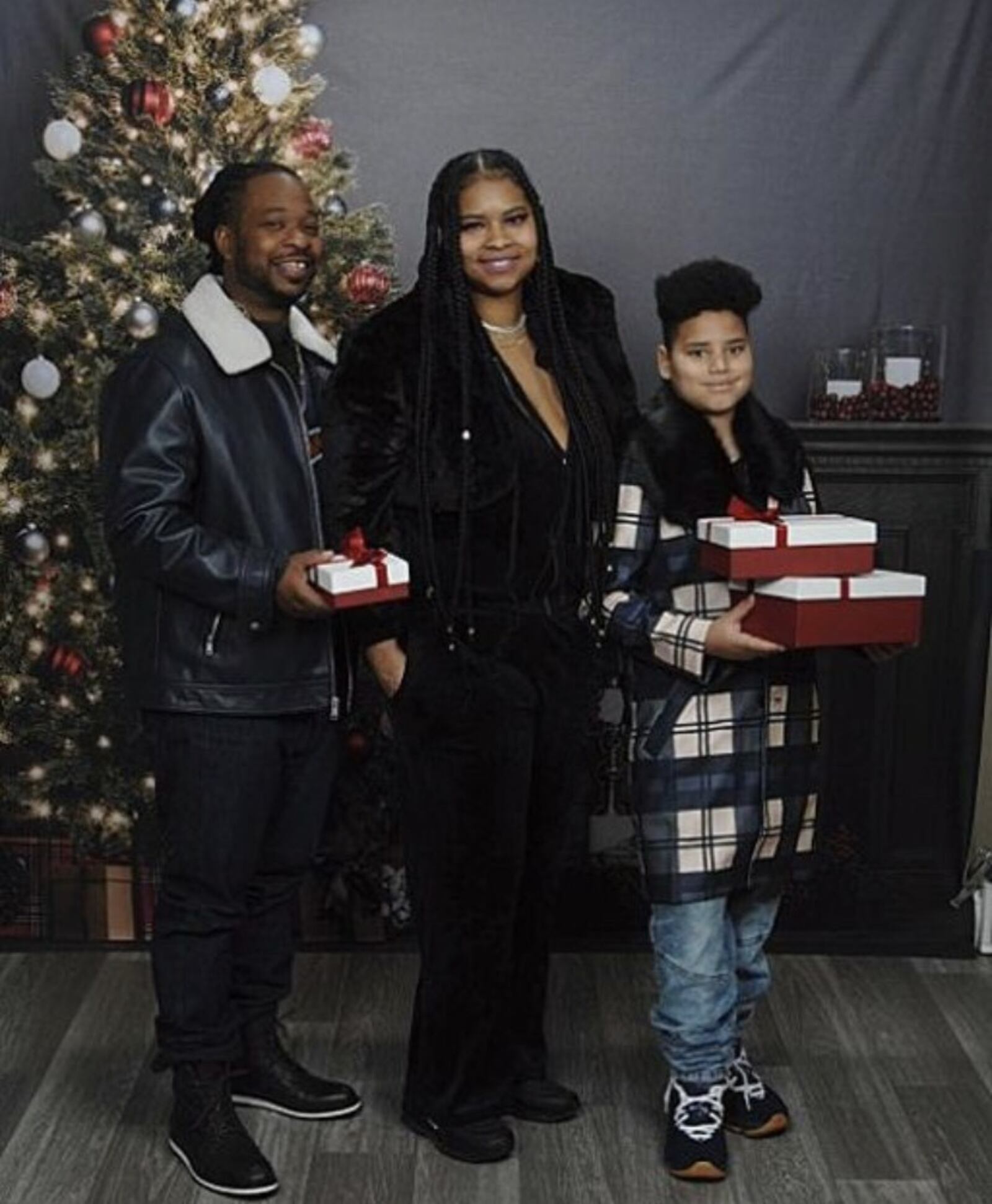 Jessica Gaston poses for a holiday photo with her husband Adrian Gaston and son William. CONTRIBUTED PHOTO