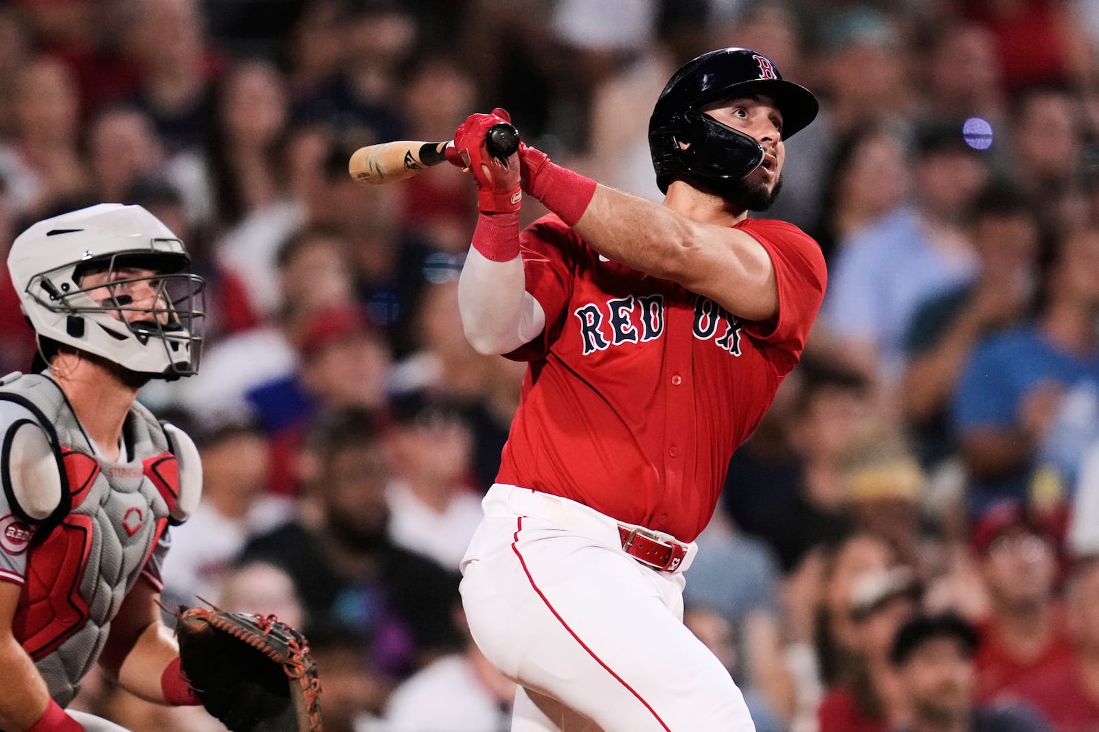 Boston Red Sox's Wilyer Abreu watches the flight of his two-run home run off Cincinnati Reds pitcher Nick Martinez during the sixth inning of a baseball game at Fenway Park, Wednesday, July 2, 2025, in Boston. (AP Photo/Charles Krupa)