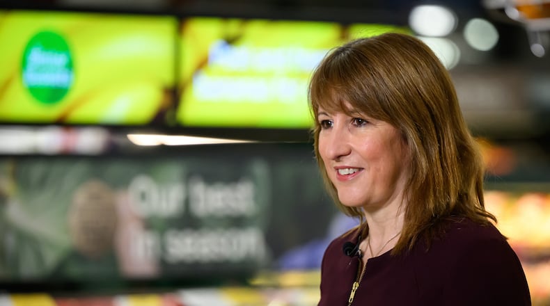 British Chancellor of the Exchequer Rachel Reeves speaks to the media during a visit to a branch of the Tesco supermarket chain in London, Wednesday Nov. 19, 2025 in. (Leon Neal/Pool Photo via AP)