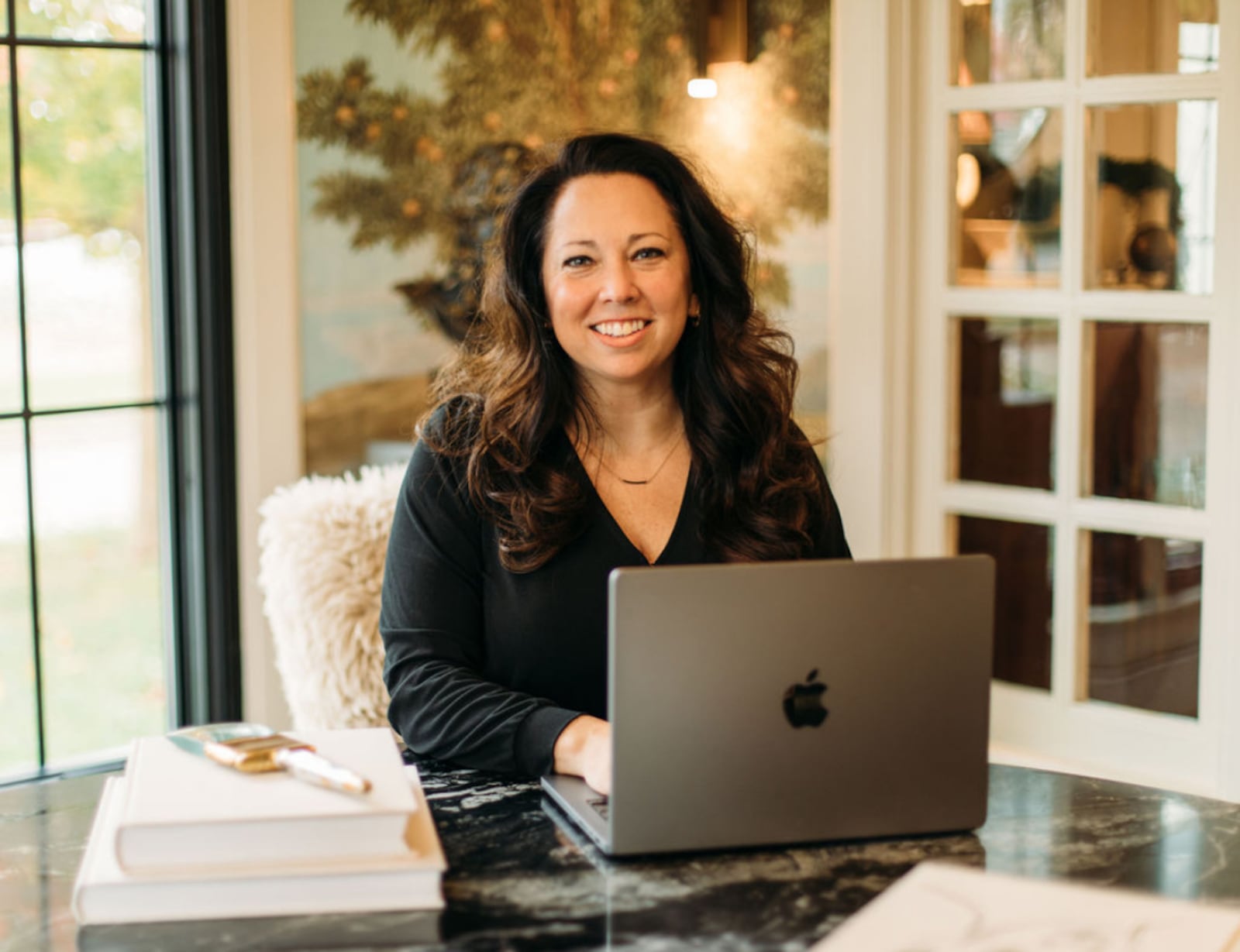 Katie Hill, founder of Unlisted, in an unlisted home in Oakwood. CONTRIBUTED.