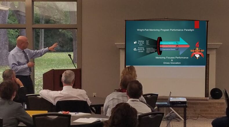 Dr. Tom Tirey explains the Team Wright-Patt Mentoring Program performance model Oct. 31 at the Twin Base golf course’s Jones Room. (Contributed photo)