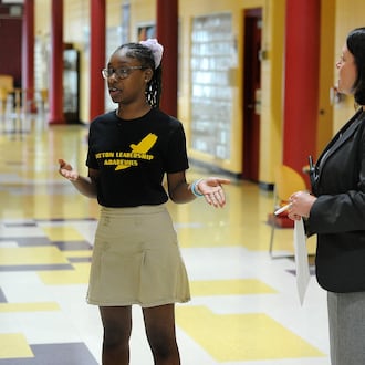The Dayton Leadership Academy 8th grade student Amyah Owens, with Executive Director, Tess Mitchner Asinjo, talks about what she likes about going to the Academy in 2023. FILE