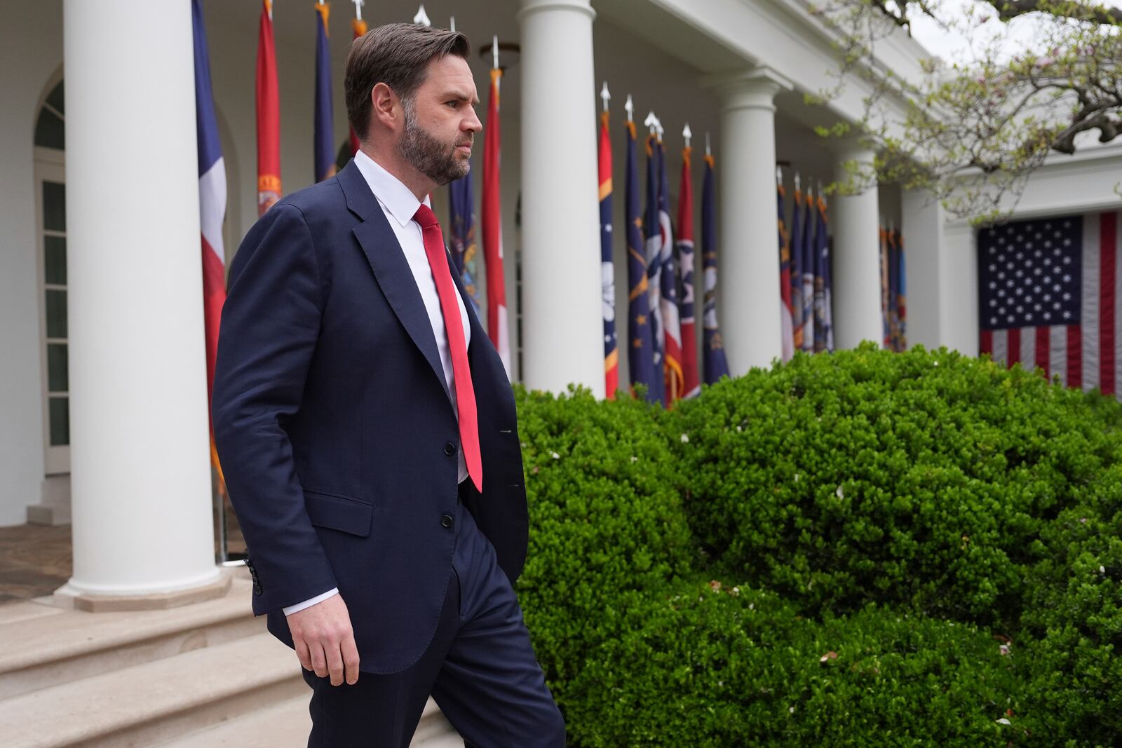 Vice President JD Vance arrives before President Donald Trump speaks during an event to announce new tariffs in the Rose Garden of the White House, Wednesday, April 2, 2025, in Washington. (AP Photo/Evan Vucci)
