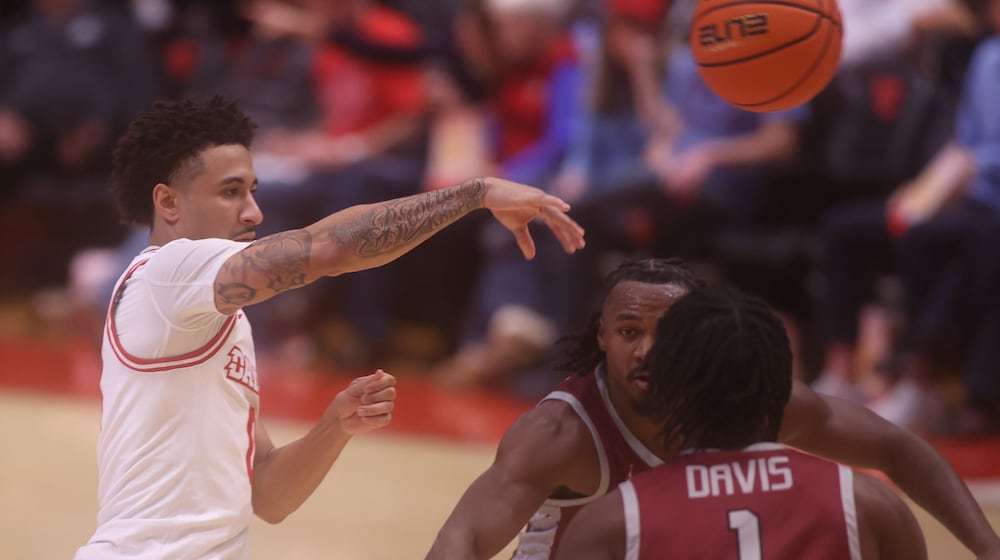Dayton's Javon Bennett passes against North Carolina Central on Saturday, Nov. 22, 2025, at UD Arena. David Jablonski/Staff