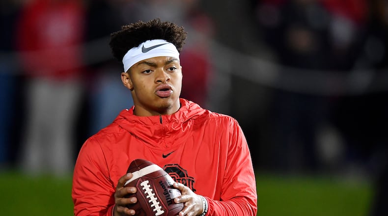 EVANSTON, ILLINOIS - OCTOBER 18: Justin Fields #1 of the Ohio State Buckeyes warms up before the game against the Northwestern Wildcats at Ryan Field on October 18, 2019 in Evanston, Illinois. (Photo by Quinn Harris/Getty Images)