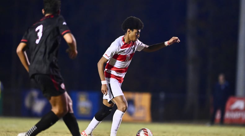 Dayton's Kenji Mboma Dem (right) was selected by FC Cincinnati on Tuesday in the MLS SuperDraft. UD Athletics photo