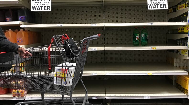 HEB on East Riverside Drive has placed a lot on bottled water purchases in response to increased demand for supplies as residents prepare for several days of severe storms following landfall of Hurricane Harvey. JAMES GREGG / AMERICAN-STATESMAN