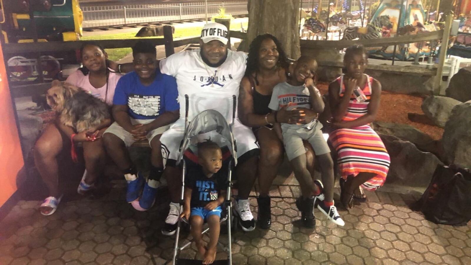 Will Edwards (center) enjoyed family outings. Here he is in Gatlinburg for the Fourth of July with (left to right) Kayla Edwards holding family dog Laney, D'Angelo Jacko, Ira butler holding Willie Edwards Jr., Anira Jacko and Liam Edwards is in the stroller. Submitted photo.