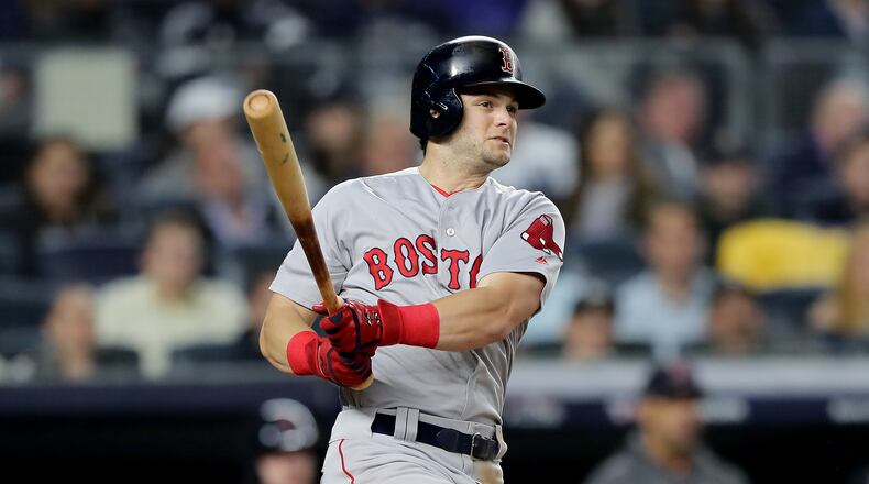 NEW YORK, NEW YORK - OCTOBER 08:  Andrew Benintendi #16 of the Boston Red Sox hits a 3 RBI double against Lance Lynn #36 of the New York Yankees during the fourth inning in Game Three of the American League Division Series at Yankee Stadium on October 08, 2018 in the Bronx borough of New York City. (Photo by Elsa/Getty Images)