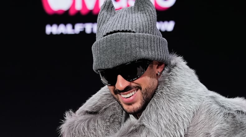 Apple Music Super Bowl LX Halftime Show performer Bad Bunny smiles during a news conference, Thursday, Feb. 5, 2026, in San Francisco ahead of the NFL Super Bowl 60 football game between the Seattle Seahawks and the New England Patriots. (AP Photo/Godofredo A. Vásquez)