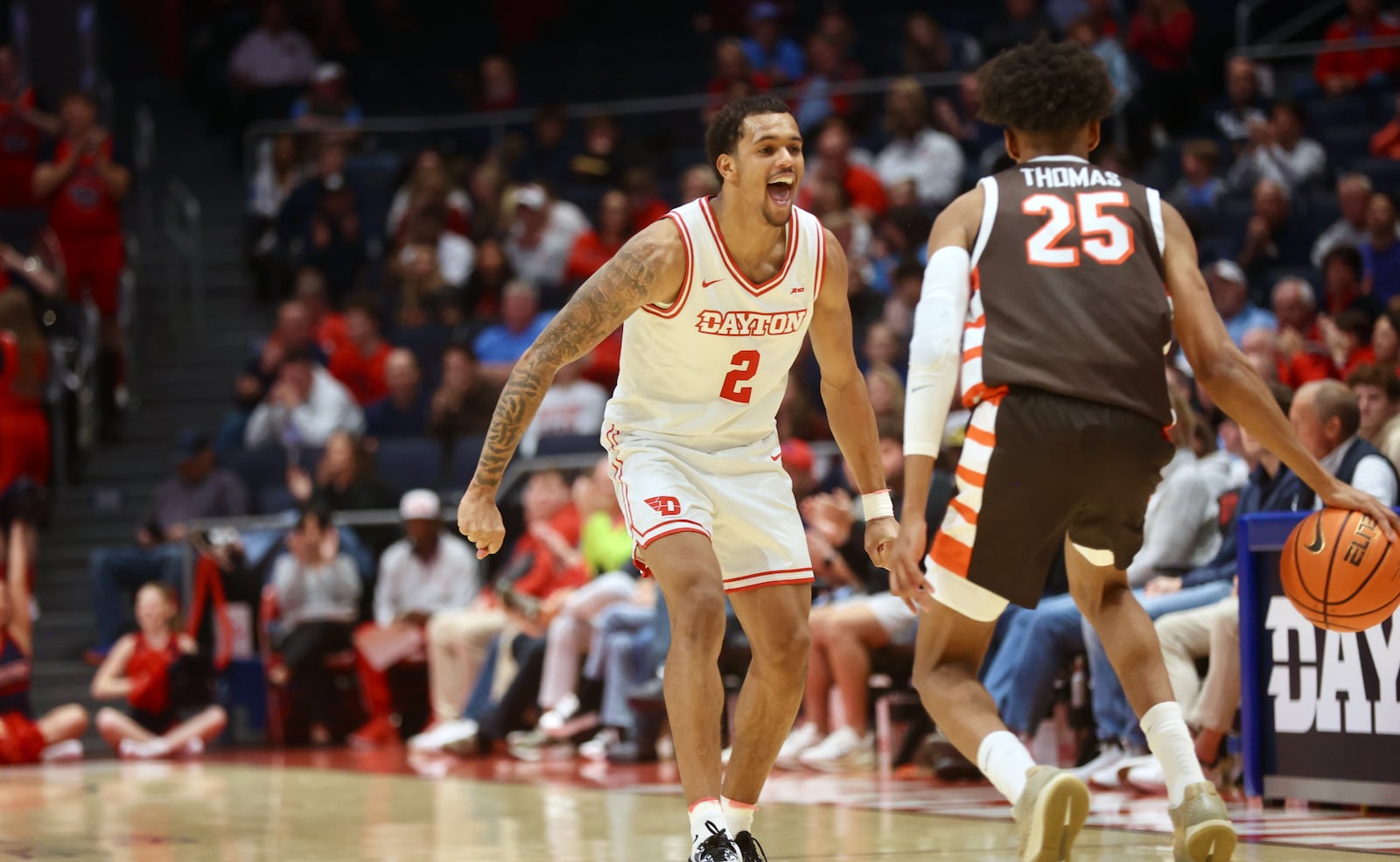 Dayton's De'Shayne Montgomery smiles as he plays defense during an exhibition game against Bowling Green on Monday, Oct. 27, 2025, at UD Arena. David Jablonski/Staff