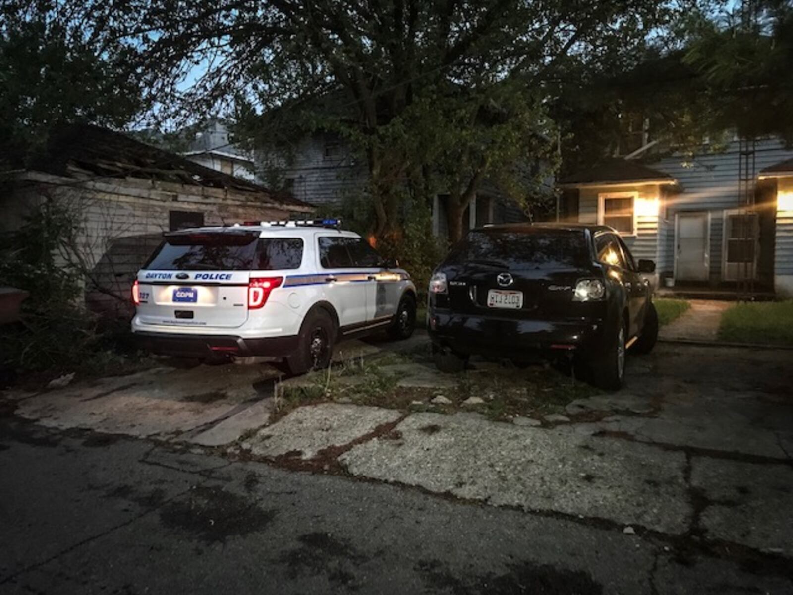 Police found this Mazda abandoned minutes after the driver tried to ram a police cruiser, and then an officer, following an attempted traffic stop Wednesday night, May 16, 2018. The suspected driver was arrested minutes later, following a foot chase. (Jim Noelker/Staff)