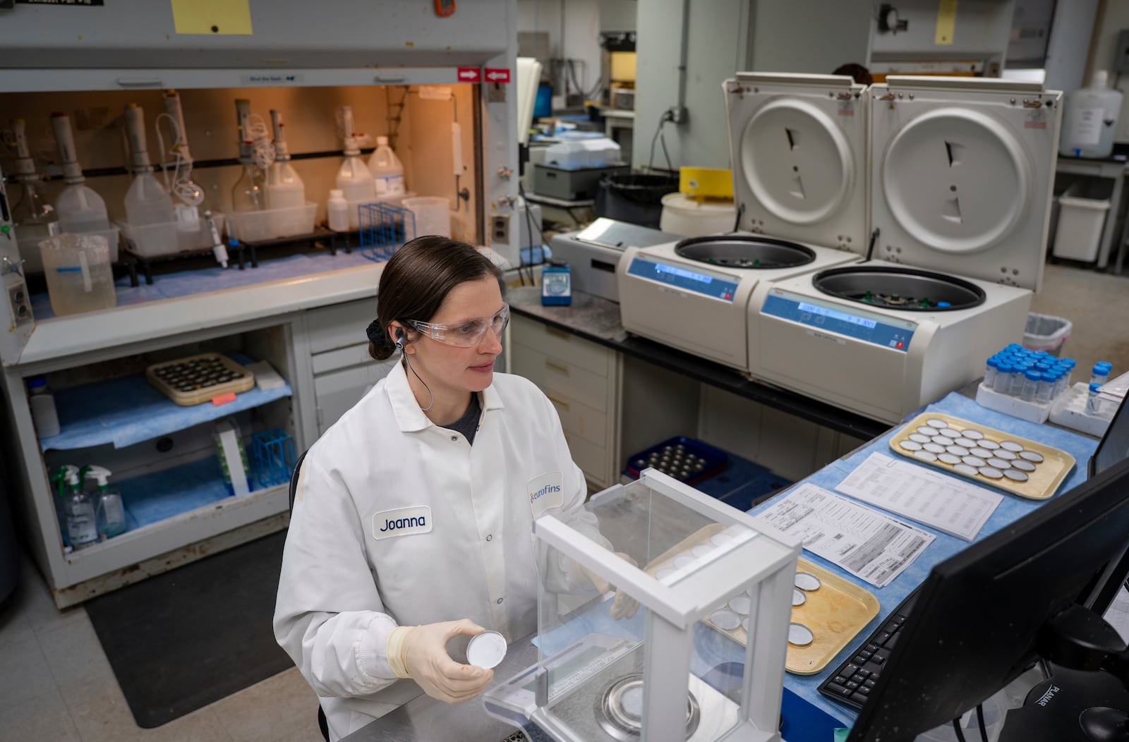 Joanna Latas, a scientist with Eurofins Environment Testing in Earth City, Mo., conducts radium analysis with water samples at the company's lab in suburban St. Louis, on Monday, March 3, 2025. Staff at Eurofins administered similar tests to water samples collected by The Toledo Blade newspaper. (Sid Hastings/The Blade via AP)