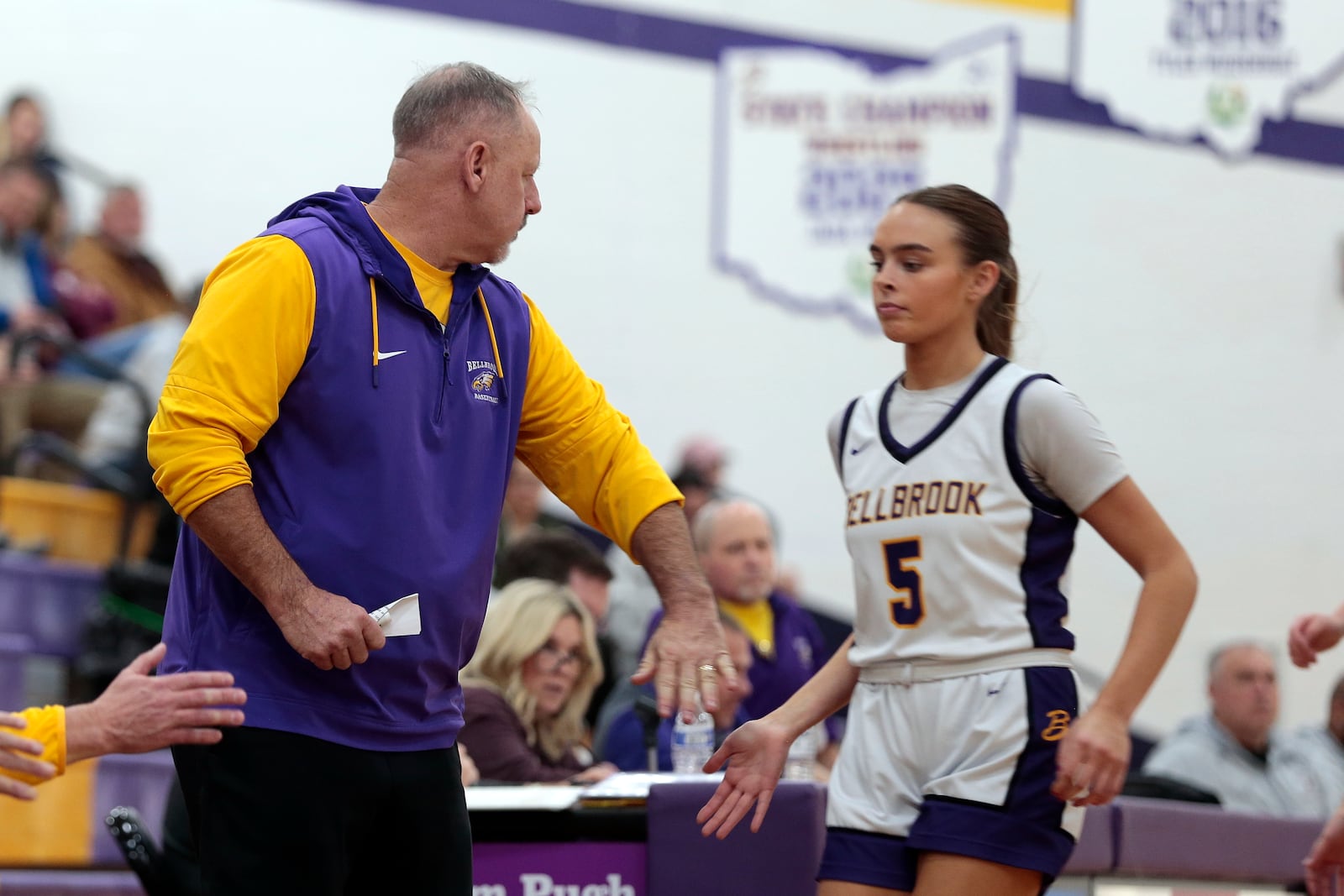 Bellbrook girls basketball head coach Jason Tincher celebrates the play of junior Georgia Beeghly as she comes off the court during a game against Lebanon on Monday, Dec. 29, 2025. STEVEN WRIGHT / STAFF