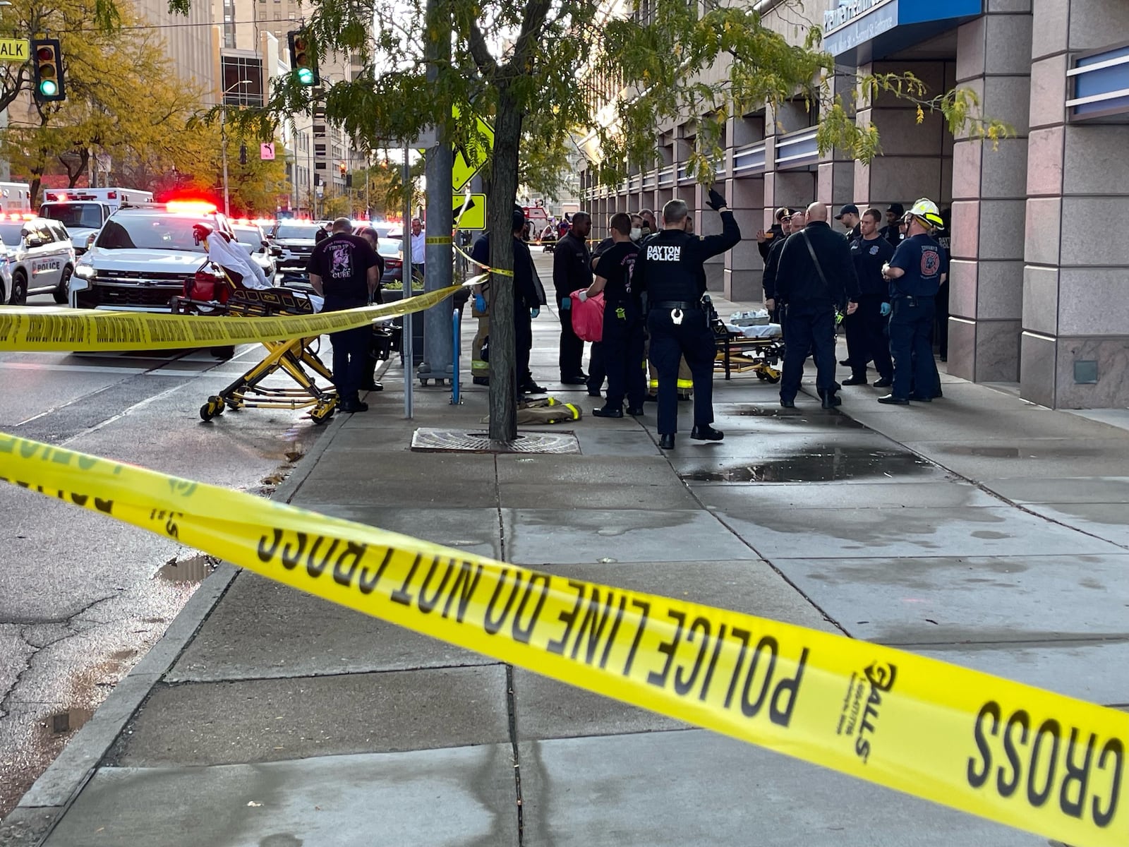 Three people were injured after Dayton firefighters responded to a fire alarm around 5 p.m. Saturday, Oct. 21, 2023, at the Premier Health building in the 100 block of North Main Street. One man was arrested after reportedly attacking a security guard and responding fire crews. PHOTO COURTESY LARRY PRICE