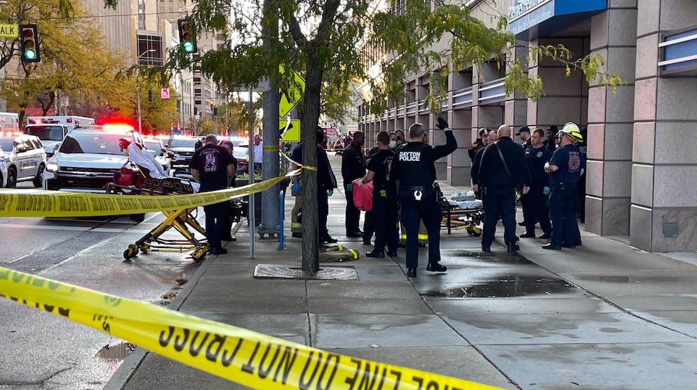 Three people were injured after Dayton firefighters responded to a fire alarm around 5 p.m. Saturday, Oct. 21, 2023, at the Premier Health building in the 100 block of North Main Street. One man was arrested after reportedly attacking a security guard and responding fire crews. PHOTO COURTESY LARRY PRICE