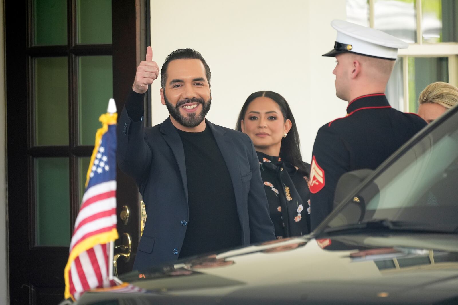 El Salvador's President Nayib Bukele gives a thumbs up as he departs following a meeting at the White House with President Donald Trump, Monday, April 14, 2025, in Washington. (AP Photo/Manuel Balce Ceneta)