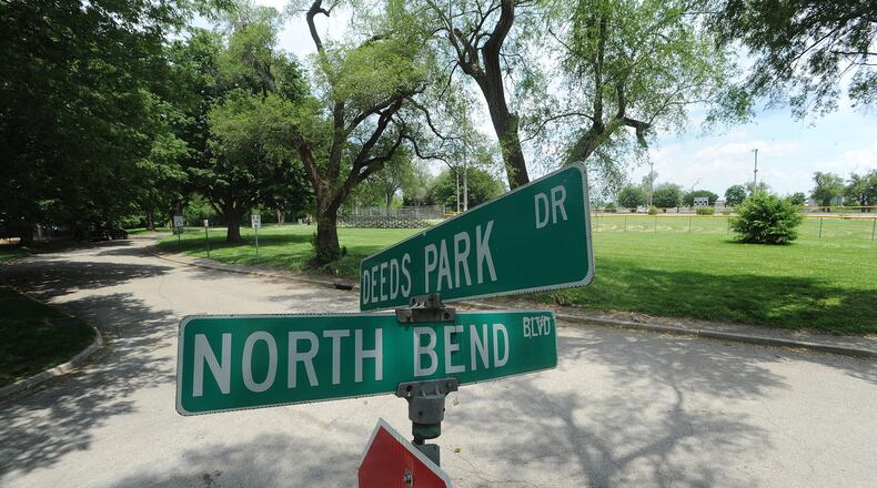 The city of Dayton will decide Wednesday whether to sell 13 acres of land near Deeds Point to an arm of The Connor Group, which plans to build a new school on the site. MARSHALL GORBY\STAFF