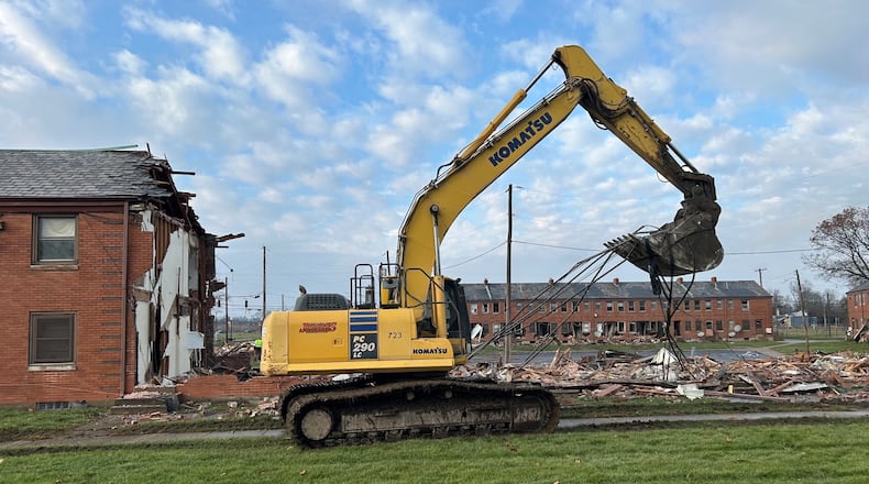 Demolition crews were knocking down multiple buildings in the DeSoto Bass public housing complex in West Dayton on Tuesday, Dec. 10, 2024. Jeremy P. Kelley/Staff Photo