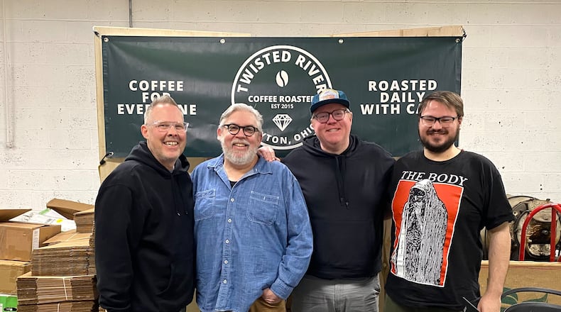 Shawn Johnson, Dan Clayton, Will Leasure and Matthew Sprinkle, of Dayton podcast "Meet Me in the City." The bi-monthly podcast explores music through the boroughs of America. BRANDON BERRY / CONTRIBUTED