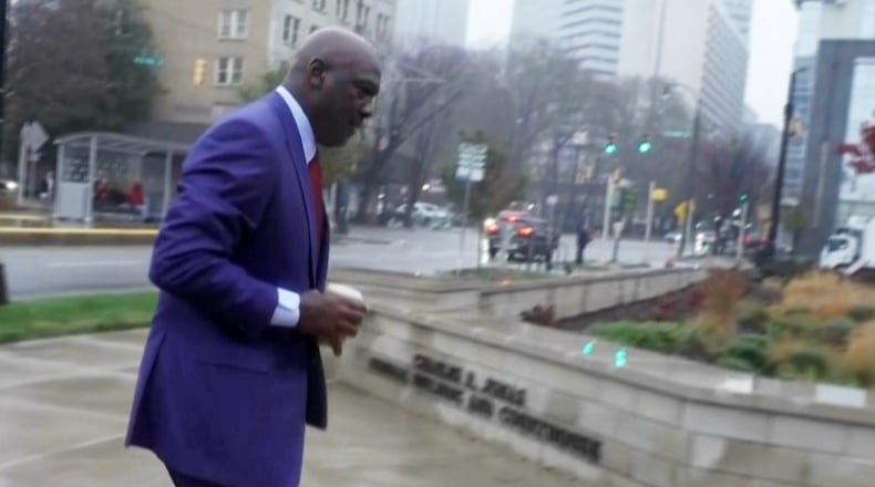 Michael Jordan arriving to federal courthouse to testify in NASCAR antitrust case on Friday, Dec. 5, 2025 in Charlotte, N.C. (AP Photo)