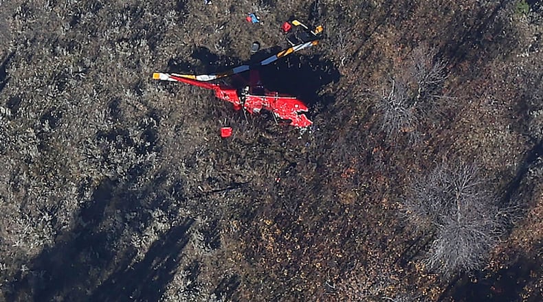 Wreckage from a helicopter carrying family members of an Illinois gubernatorial candidate that crashed on Oct. 22, 2025 is seen near Ekalaka, Mont. on Oct. 23, 2025. (Larry Mayer/The Billings Gazette via AP)