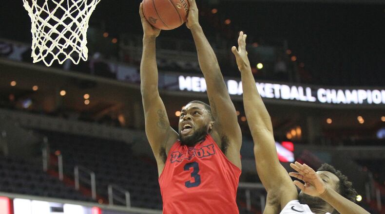 Dayton's Trey Landers dunks against Virginia Commonwealth on Thursday, March 8, 2018, at Capital One Arena in Washington, D.C.