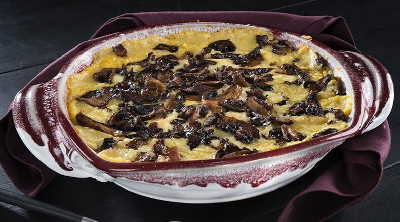 Rustic cheese baked polenta with wild mushrooms. (Tammy Ljungblad/Kansas City Star/TNS)