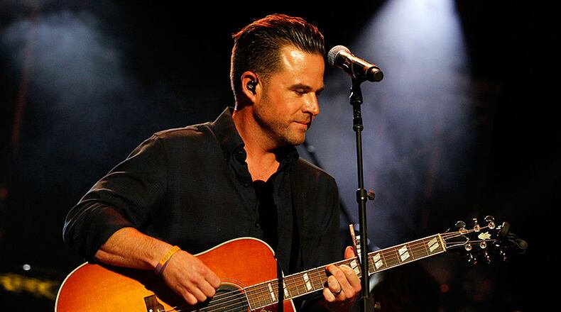 NASHVILLE, TN - MAY 06: David Nail performs on stage during Keith Urban's Fifth Annual "We're All 4 The Hall" Benefit Concert at the Bridgestone Arena on May 6, 2014 in Nashville, Tennessee. (Photo by Terry Wyatt/Getty Images for the Country Music Hall of Fame & Museum)