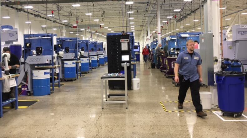 San Diego-based NuVasive says it has created the world’s largest spinal implants manufacturing center in West Carrollton. The company recently said there are 135 employees there, with 100 employees in Fairborn waiting to be transferred to West Carrollton. And there are still 35 job openings to fill, a company spokeswoman said in late July. THOMAS GNAU/STAFF