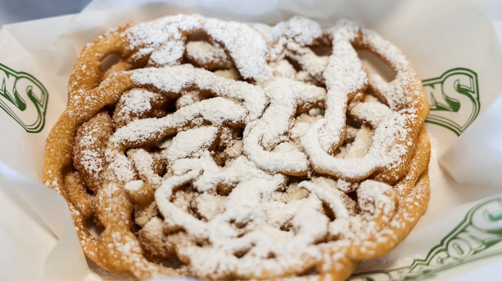 The Dayton Dragons displayed food offerings available to fans at Day-Air Ballpark this spring, including funnel cake. BRYANT BILLING / STAFF